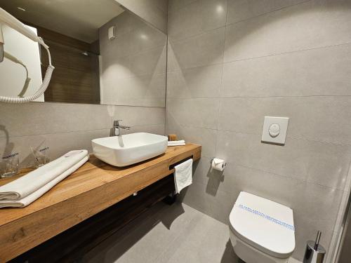 Koupelna v ubytování Hotel ETNA
