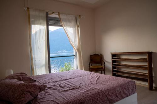 Ένα ή περισσότερα κρεβάτια σε δωμάτιο στο [COMO LAKE VIEW] Regina Apartment