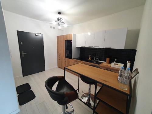 Η κουζίνα ή μικρή κουζίνα στο Apartament Business & Parking Sienkiewicza