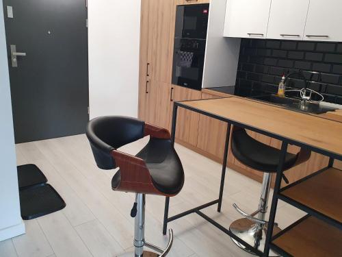 Η κουζίνα ή μικρή κουζίνα στο Apartament Business & Parking Sienkiewicza
