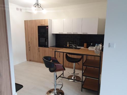 Η κουζίνα ή μικρή κουζίνα στο Apartament Business & Parking Sienkiewicza
