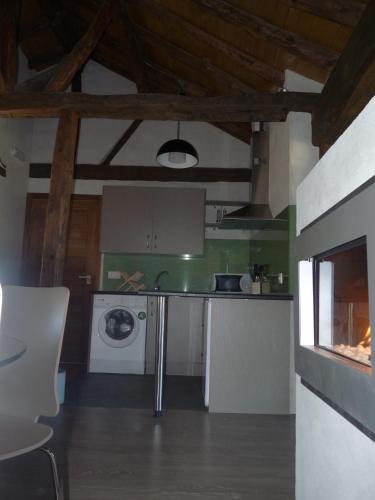Η κουζίνα ή μικρή κουζίνα στο Suite rural con jacuzzi