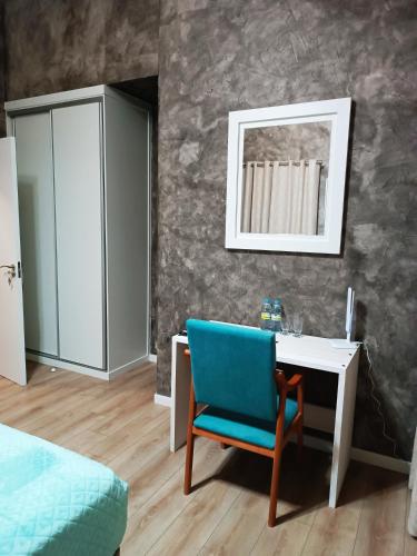 Ένα ή περισσότερα κρεβάτια σε δωμάτιο στο Hotel Alma Rosa
