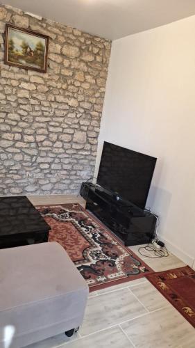 TV a/nebo společenská místnost v ubytování Appartement 1chambre et 1salon