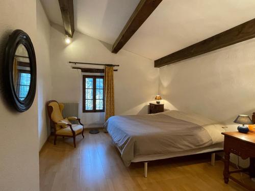 Ένα ή περισσότερα κρεβάτια σε δωμάτιο στο Villa charmante à Castelnou avec piscine privée