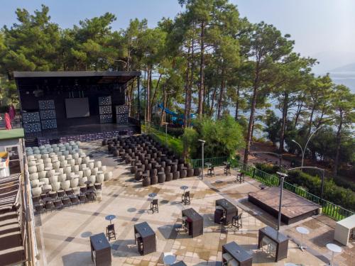 an amphitheater with chairs and a stage at Orka Lotus Beach in Marmaris