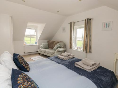 Postel nebo postele na pokoji v ubytování North Studdock Cottage