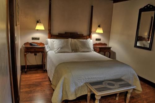 Кровать или кровати в номере Hotel Villa de Torla