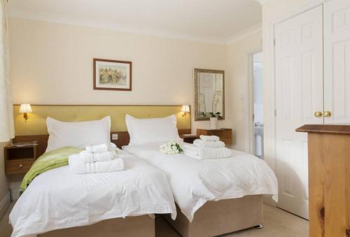 Ένα ή περισσότερα κρεβάτια σε δωμάτιο στο Chipping Campden - Cotswolds private house with garden