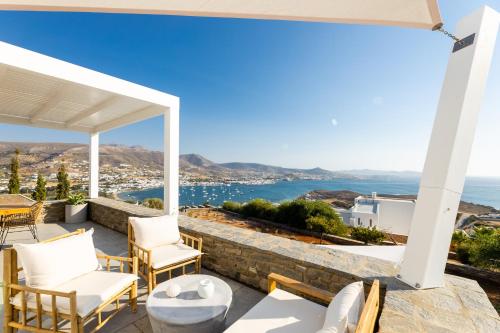 a patio with a view of the ocean at Mirabilia, Unique view meets true elegance in Krotiri