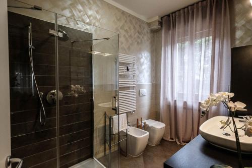 Koupelna v ubytování Verona Suites and Rooms