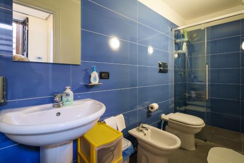 Ванная комната в La casetta al Massimo by DomuSicily