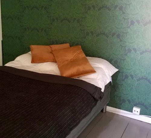 Postel nebo postele na pokoji v ubytování Kotona Tampereella, Pispalassa