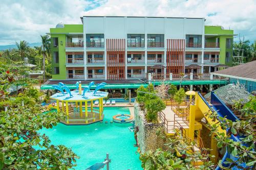an image of a resort with a water park at Moalboal Tropics in Moalboal