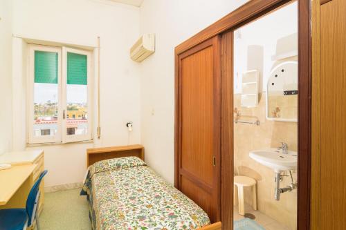 Koupelna v ubytování Hotel Riviera