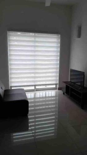 a room with a large window with a couch and a piano at Simple Home Taiping 简居 @ Suria Aman in Kamunting