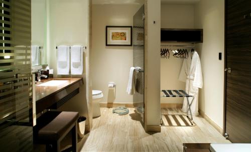 a bathroom with a sink and a toilet at M Resort Spa & Casino in Las Vegas