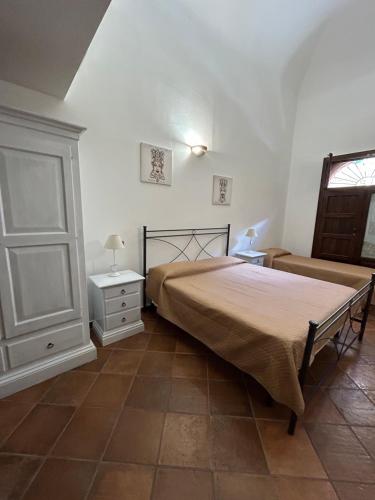Una cama o camas en una habitación de B&B Cinisi Vacanze
