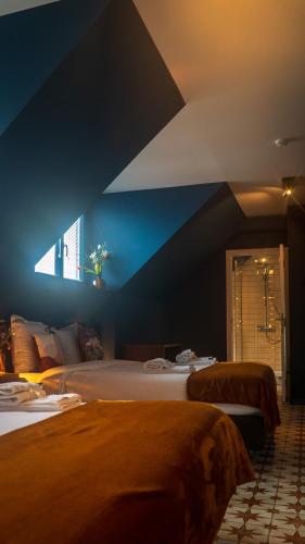 Gran Hotel De Passageにあるベッド