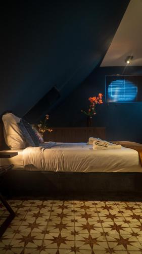 Gran Hotel De Passageにあるベッド