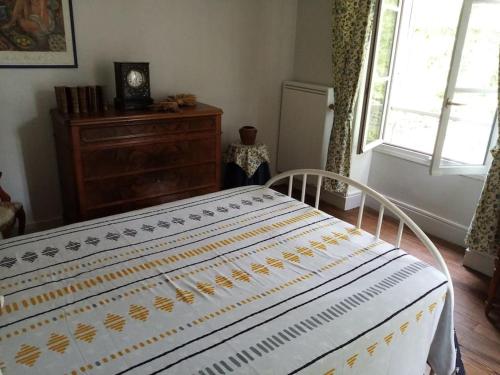 Postel nebo postele na pokoji v ubytování Gîte Sous L' Orme