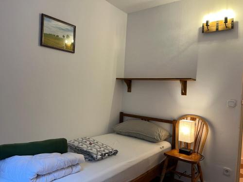 Postel nebo postele na pokoji v ubytování Rivendell I3