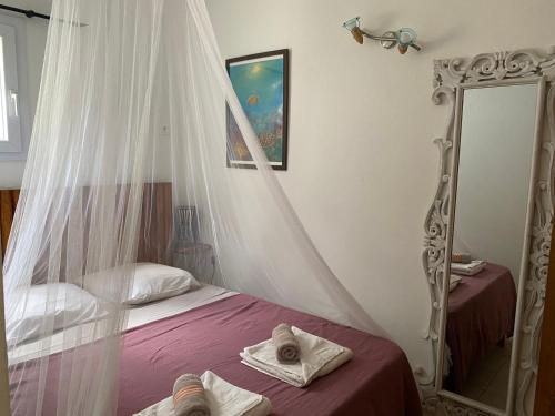 Llit o llits en una habitació de La Case de Guy