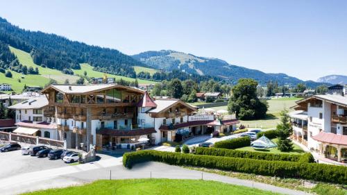 an aerial view of a town in the mountains at Vitalhotel Sonnenhof in Going