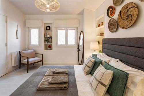 En eller flere senge i et værelse på Casa Paraíso Cascais