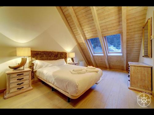 Ένα ή περισσότερα κρεβάτια σε δωμάτιο στο CASA ALPINA de Alma de Nieve