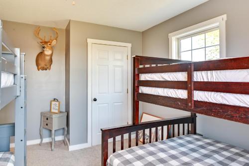a kids room with a bunk bed and a ladder at Quiet Kentucky Vacation Rental with Hot Tub in Berry
