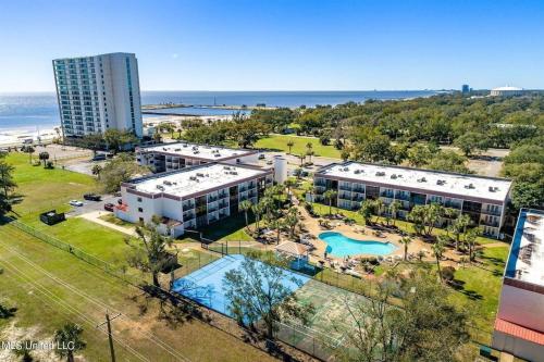 an aerial view of a resort with a swimming pool at Biloxi Beach Condo-B in Biloxi