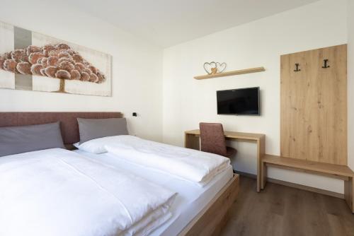 Ένα ή περισσότερα κρεβάτια σε δωμάτιο στο Kleon 1