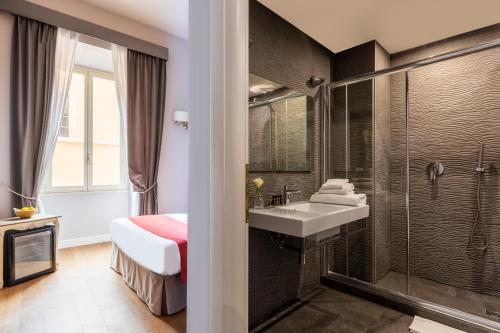 Kúpeľňa v ubytovaní Spagna Art & Suites - CA Domus Collection