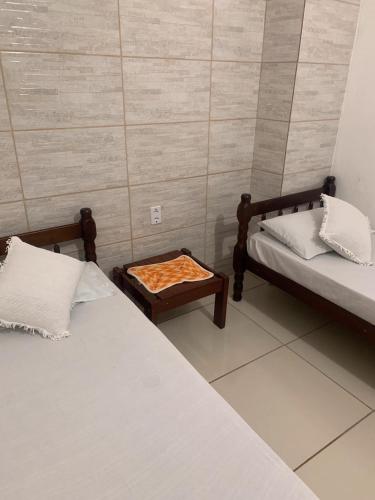 Postel nebo postele na pokoji v ubytování Hotel Pousada AngraAntiga