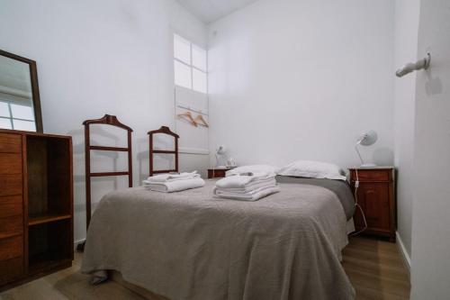 Ένα ή περισσότερα κρεβάτια σε δωμάτιο στο Home Lisbon 3