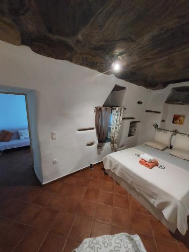 a bedroom with a bed in a room at Green Oasis 3 in Lámira