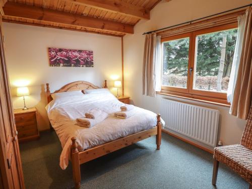 Katil atau katil-katil dalam bilik di Teal Lodge