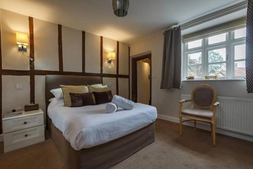 Voodi või voodid majutusasutuse NEW The Green House B&B Cromer Sleeps 20 Hot Tub toas