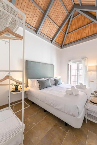 a bedroom with a bed and a bunk bed at ISG Apartments Zaragoza-FREE PARKING in Seville