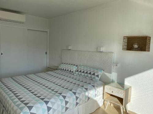 Postel nebo postele na pokoji v ubytování Hostal Roberto