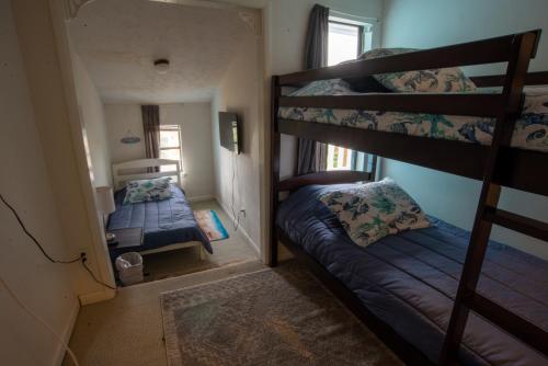 OceanView Oasis - Relax with Hot Tub, Breakfast, Fire Pit & Putting Green! photo 25