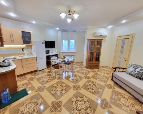 Kiev Apartment tesisinde bir oturma alanı