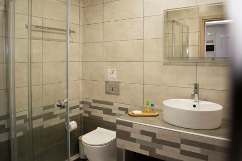 Un baño de Big Max Guesthouse