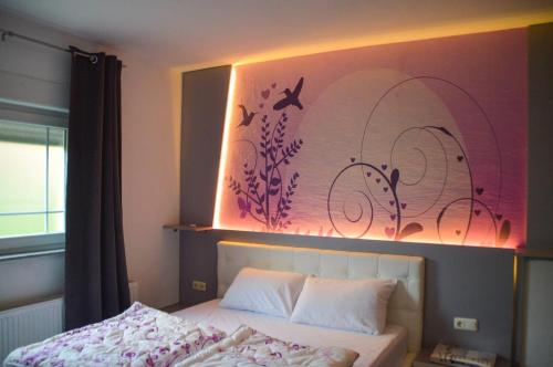 Ένα ή περισσότερα κρεβάτια σε δωμάτιο στο Apartman D&D