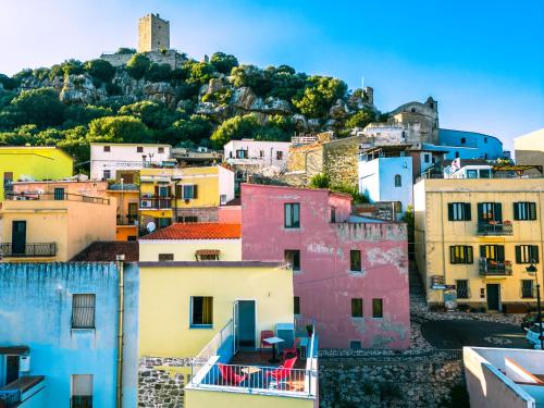 a view of a city with buildings at Panoramic Loft con uso cucina ,Casa Raimonda, Ammentos Posada in Posada