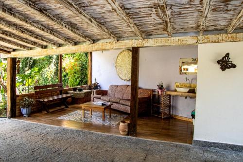 Χώρος καθιστικού στο Casa de Violeta Pousada