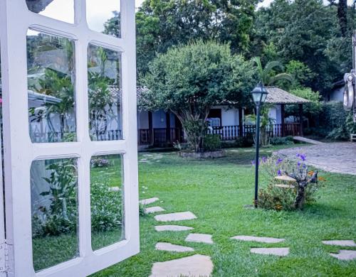 Κήπος έξω από το Casa de Violeta Pousada