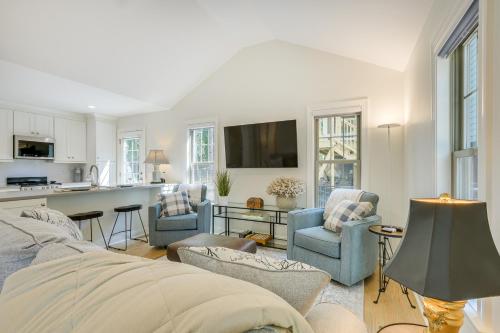 a living room with a couch and chairs and a kitchen at Beautiful Raleigh Cottage Rental 5 Mi to Downtown in Raleigh