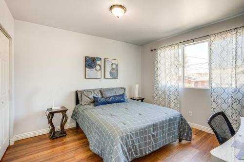 a bedroom with a bed and a window at Sunny Oakland Vacation Rental - 6 Mi to Downtown in Oakland